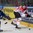 MINSK, BELARUS - MAY 18: Canada's Nathan MacKinnon #29 chasing a bouncing puck with Sweden's Niclas Andersen #9 during preliminary round action at the 2014 IIHF Ice Hockey World Championship. (Photo by Richard Wolowicz/HHOF-IIHF Images)